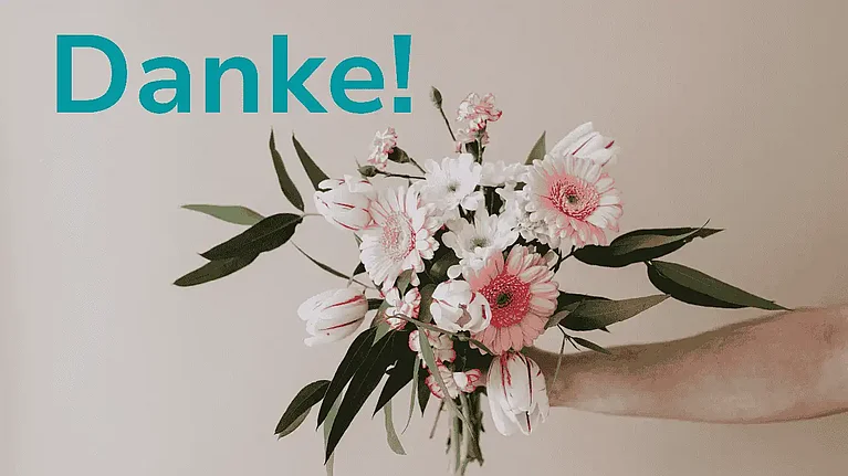 Blumenstrauss mit einem Danke! darauf