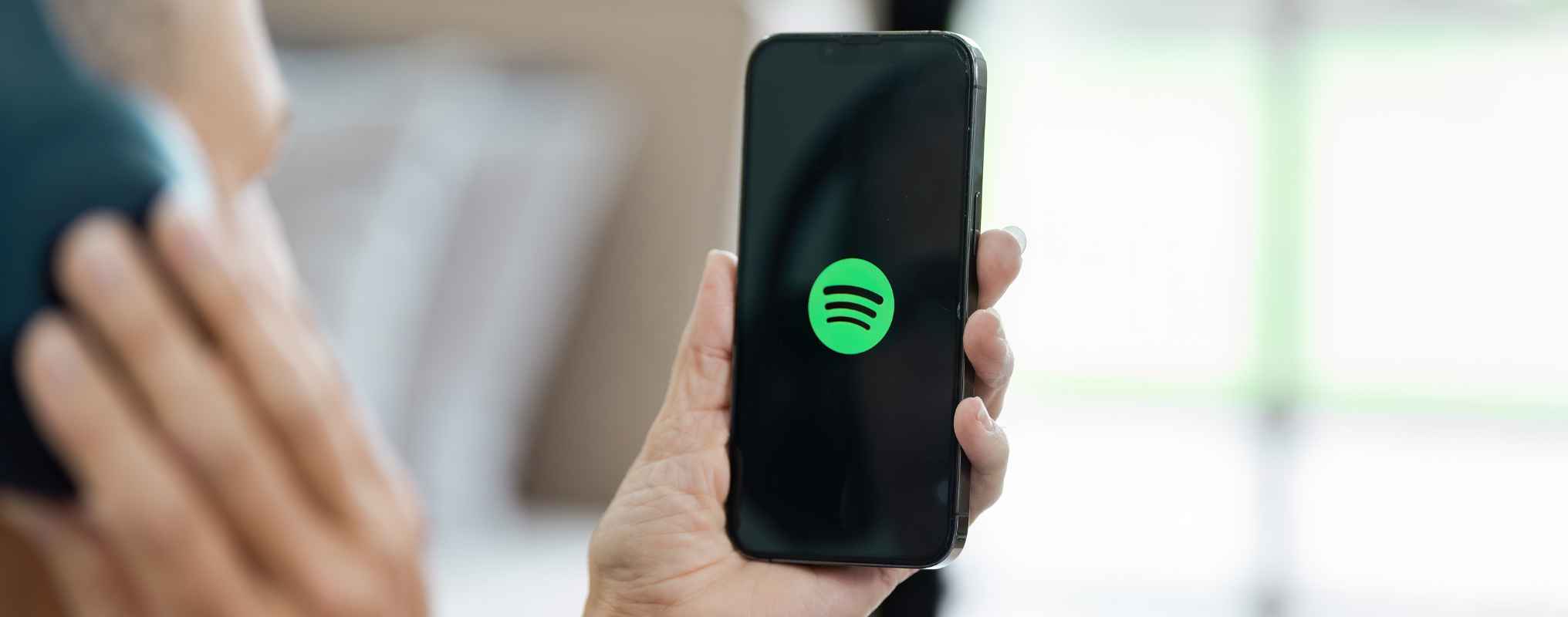 Handy, auf welchem Spotify geöffnet wird